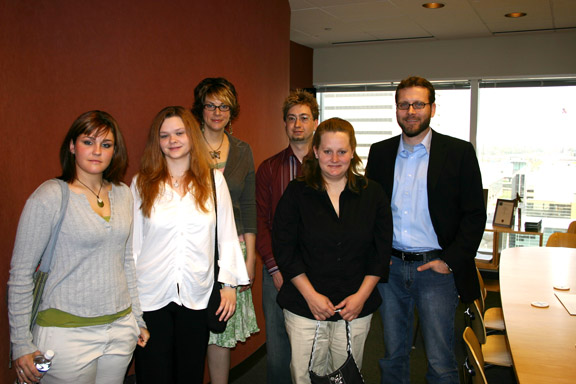 Students with artists at Bailey Lauerman Marketing/Communications