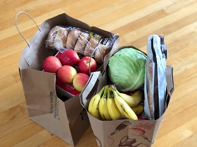 An image of two paper bags of groceries