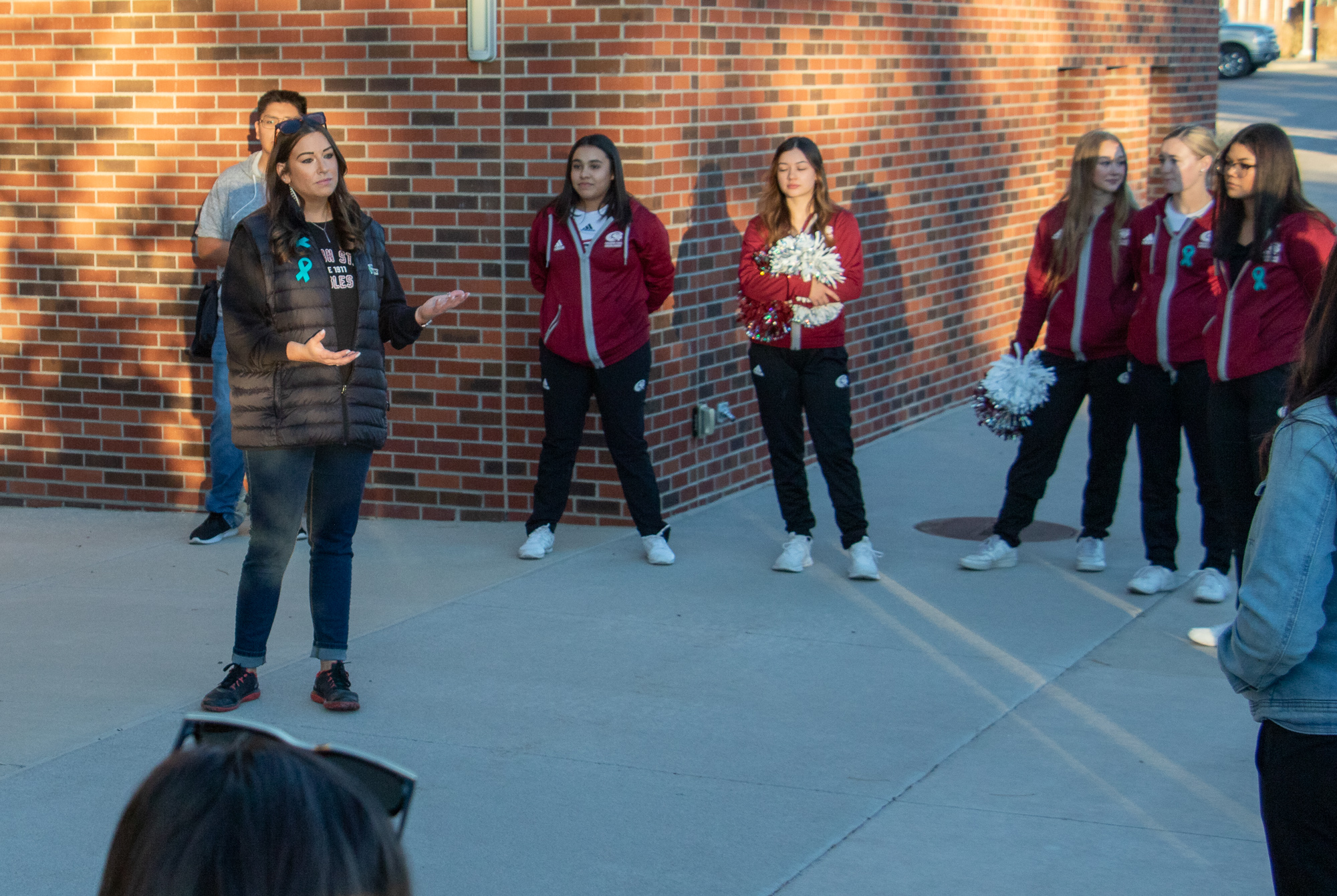 Counselor Amy Carnahan speaks to students at the Take Back the Night Walk for sexual assault awareness