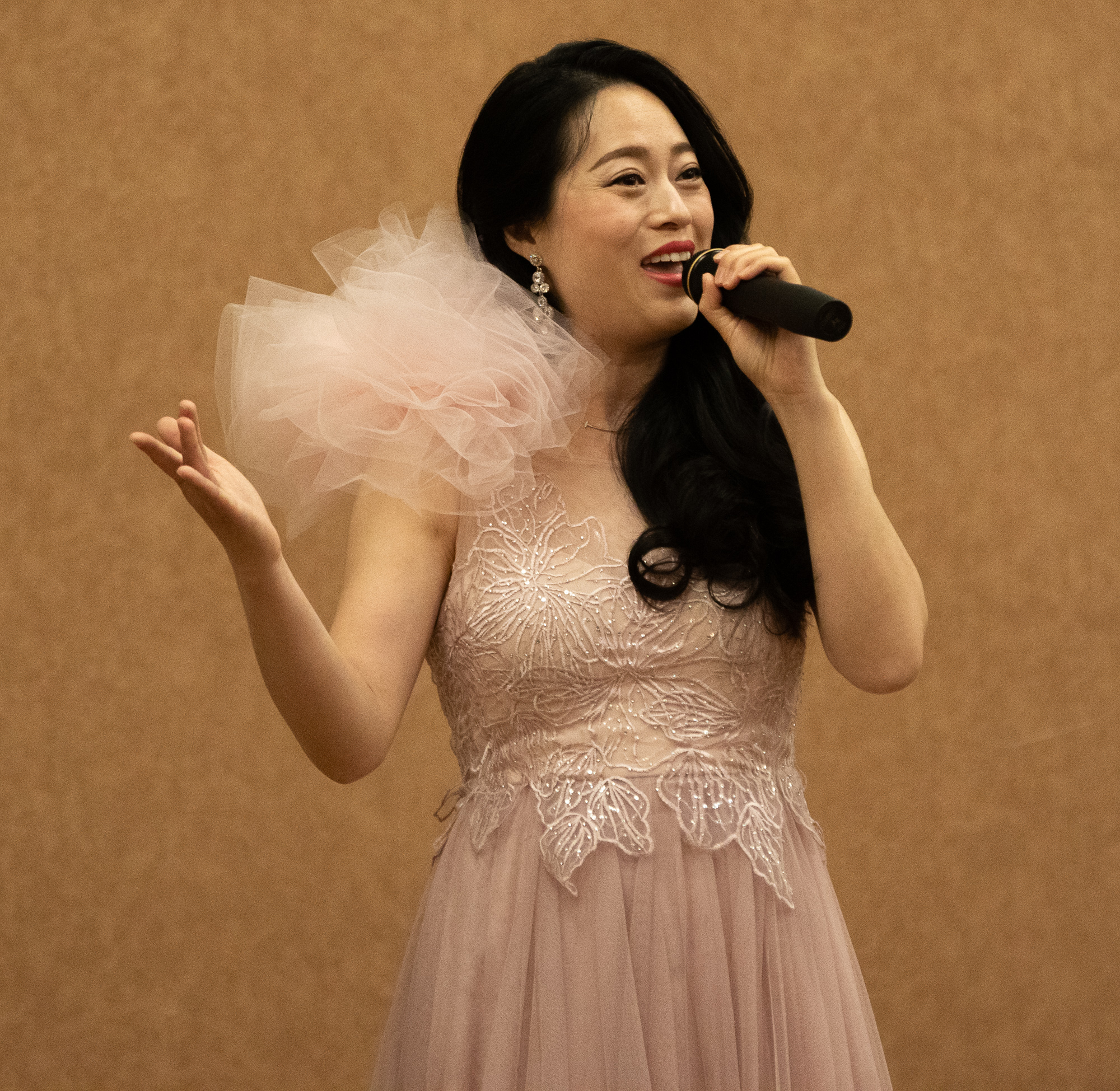 Chinese opera singer – Yan Liu of Rapid City, SD performs during the 39th Annual Chadron State College International Club Food Tasting Party