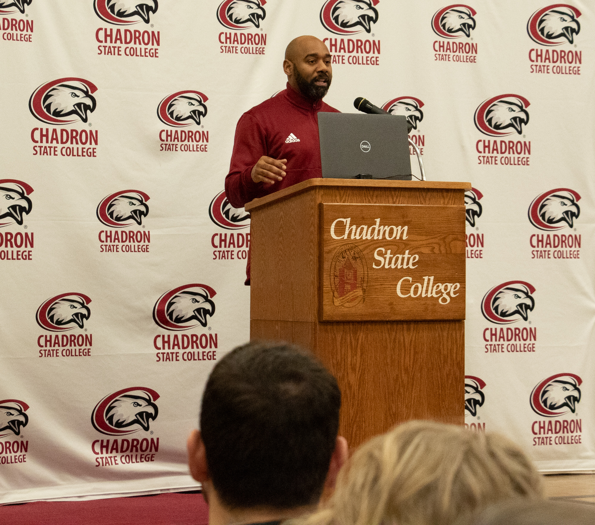 Coach Kyle Hunt speakers at the CSC Black Excellence Expo