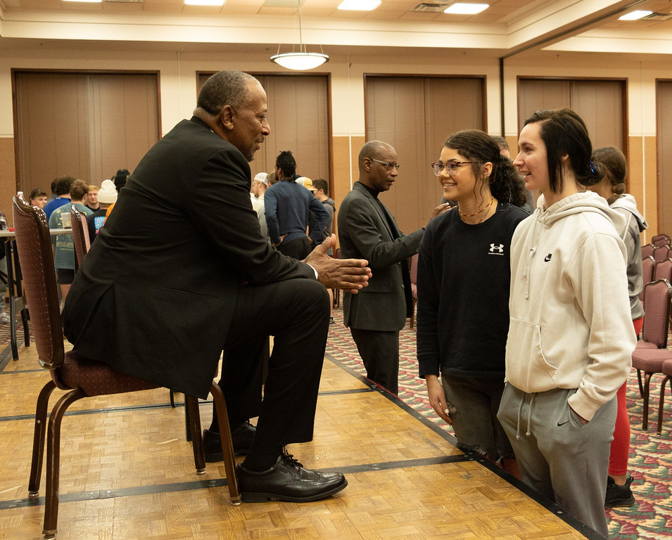 Actor John Ivey, left, speaks with Chadron State College students Emily Beye and Elizabeth Hunt after portraying Martin Luther King Jr. in a one-man play written by Ira Knight Jan. 16, 2023.