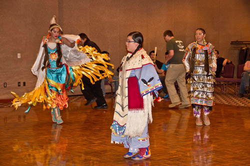 Red Cloud School Inc. students, from left, Taylor Brooks, Shyanne O'Rourke and Rachel Kelly, dance in the Chadron State College Ballroom as part of Native American Month.