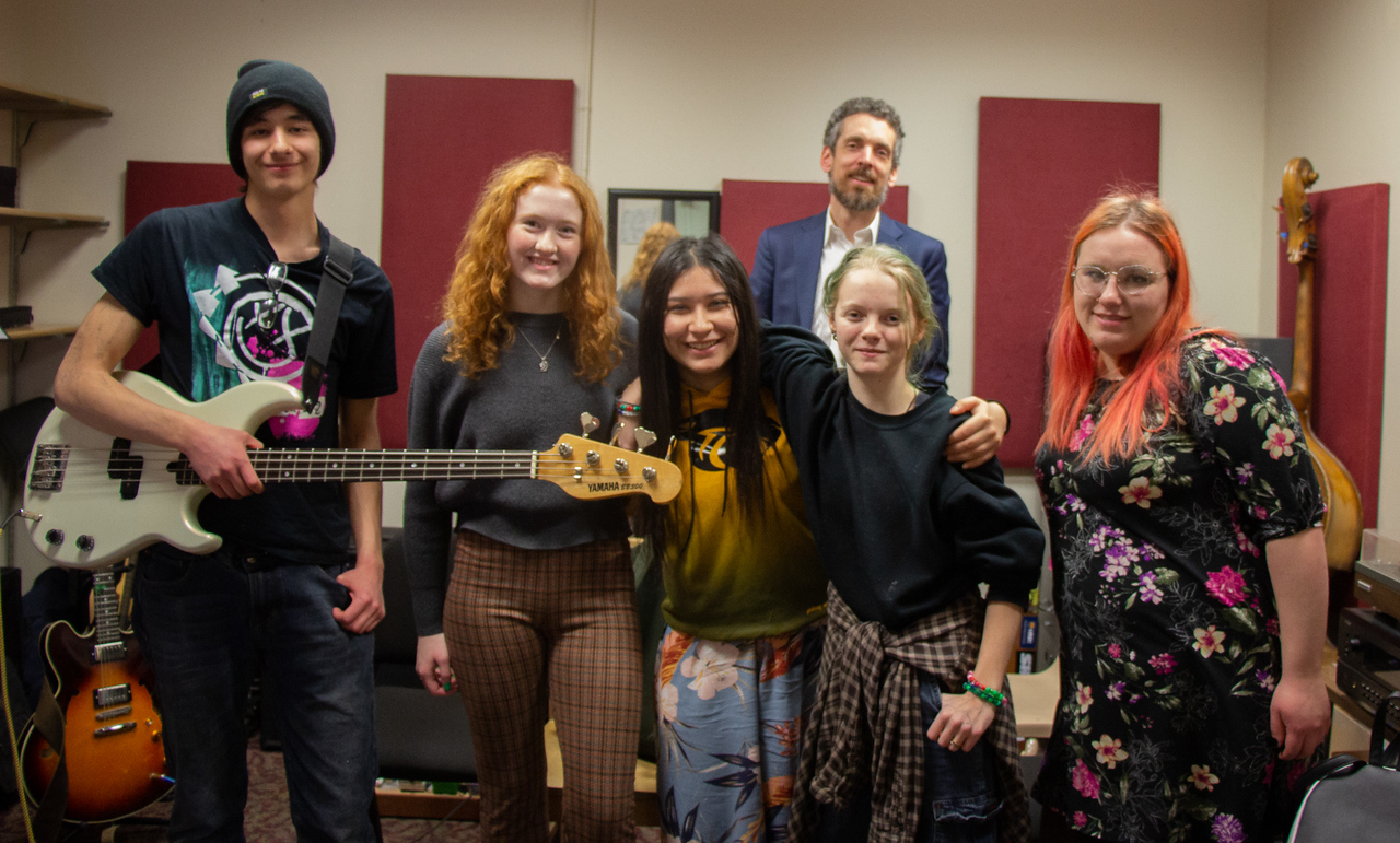 Students with a guitar