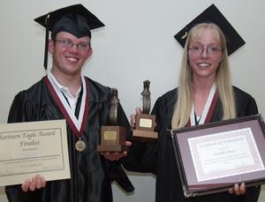 Kurt Elder and Danielle Meyer display their awards.