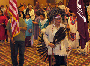 Tom Cook performs in powwow