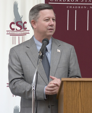 Nebraska Gov. Dave Heineman addresses the crowd during a reception at Chadron State College.