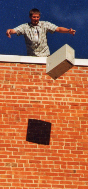 A CSC student drops a computer from the top of a building on campus.