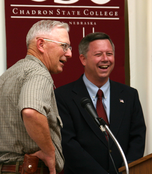 Nebraska Gov. Dave Heineman laughs as Chadron Mayor John Gamby.