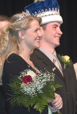 Amy Madison and Carl Fanning smile after being announced the Ivy Day queen and king.