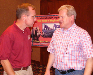 Mike Leite, Chadron State geoscience professor, visits with Dick Mol.