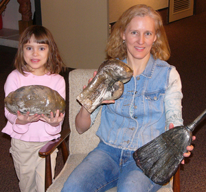 Eileen Doktorski and her 5-year-old daughter Paisley display a few items.