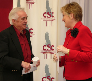 Ron Hull and Janie Park converse following today's news conference.