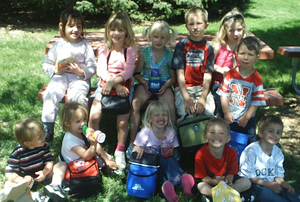 Children pose at 'Summer Camp.'