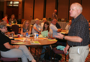 Time Donahue speaks to attendees of the conference.