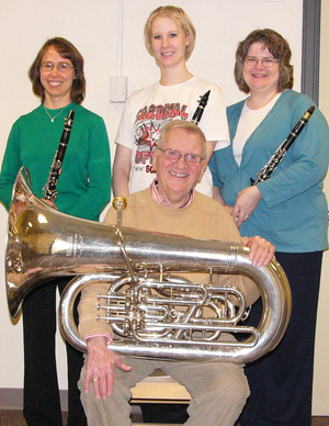 Dr. William Winkle on the tuba and three clarinetists. They are, from left, Laura Empson, Malinda Linegar and Kim Ouderkirk.