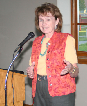 Yvonne Hollenbeck recites her poetry during a program in the Sandoz Center at Chadron State College on Monday night.