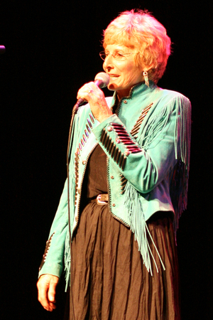 Lyn Messersmith of Alliance recites a poem Friday night during Chadron State College's third Cowboy Poetry Gathering.