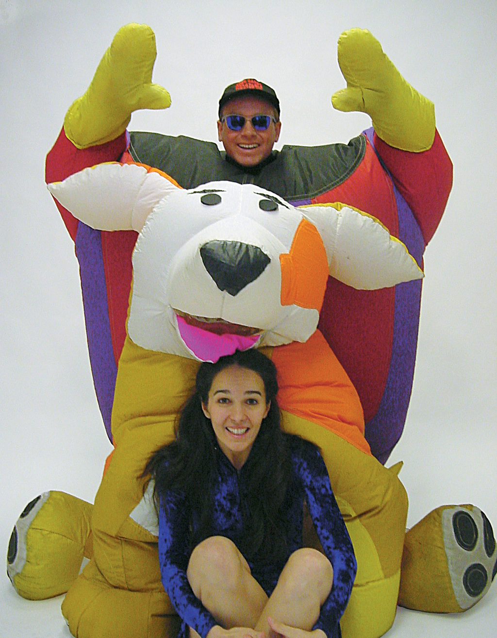 People pose with inflatables