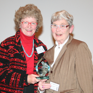 Judy McDonald receives an award