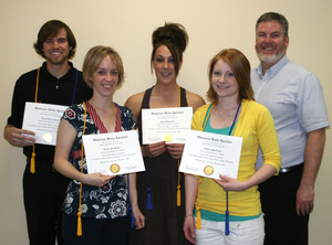 Students hold awards