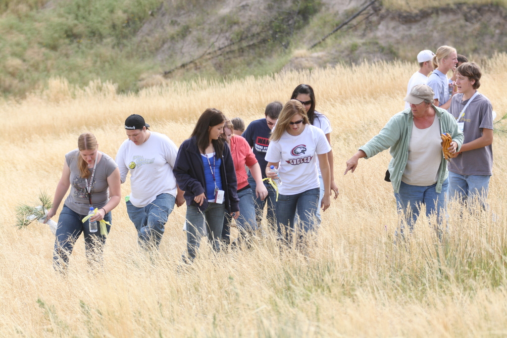 Chadron State College freshman make their way up C Hill to plant trees in the reforestation effort last fall.