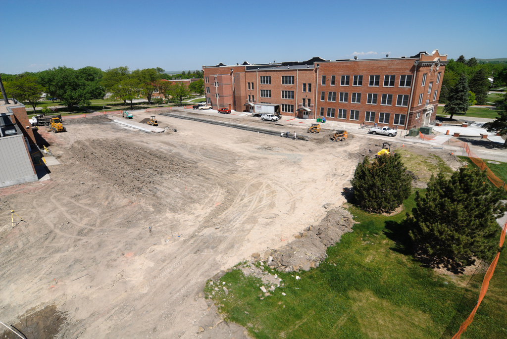 A construction crew works on the parking lot behind Old Admin in late May 2009.