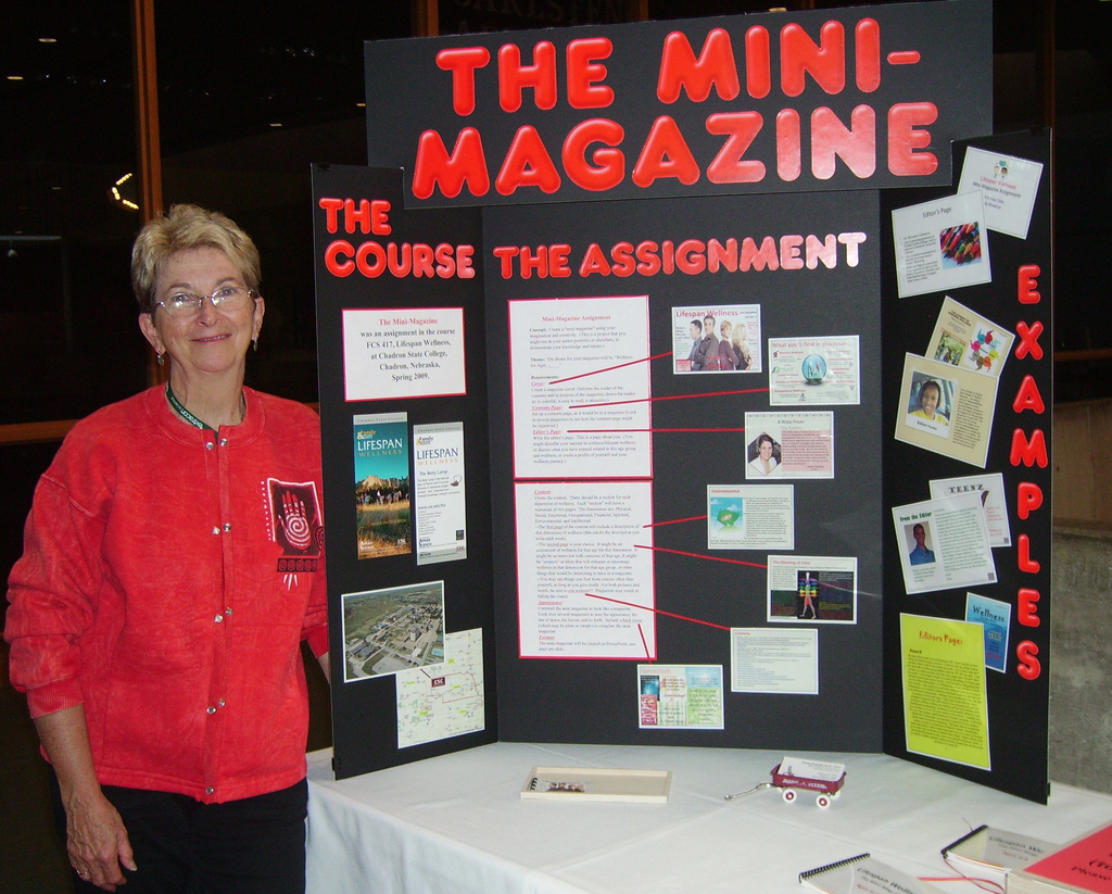 Dr. Norma Nealeigh displays the poster she presented at the National Wellness Conference at Stevens Point, Wis., this summer.