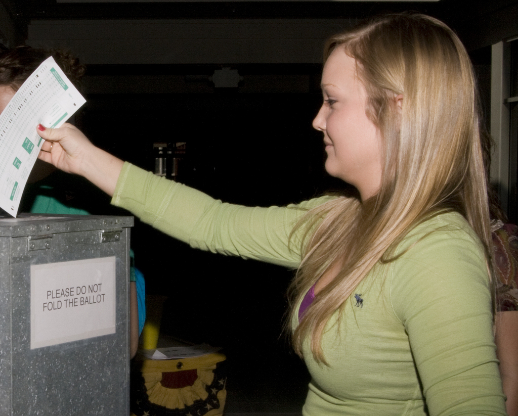 CSC student Haley Kathol submits her ballot during the Student Senate election.