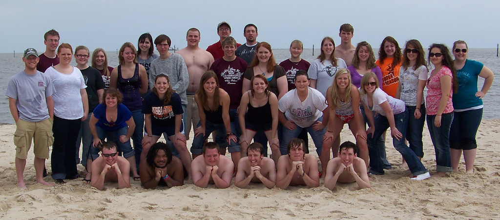 The Chadron State College Alternative Spring Break students gather for a photo on the beach.