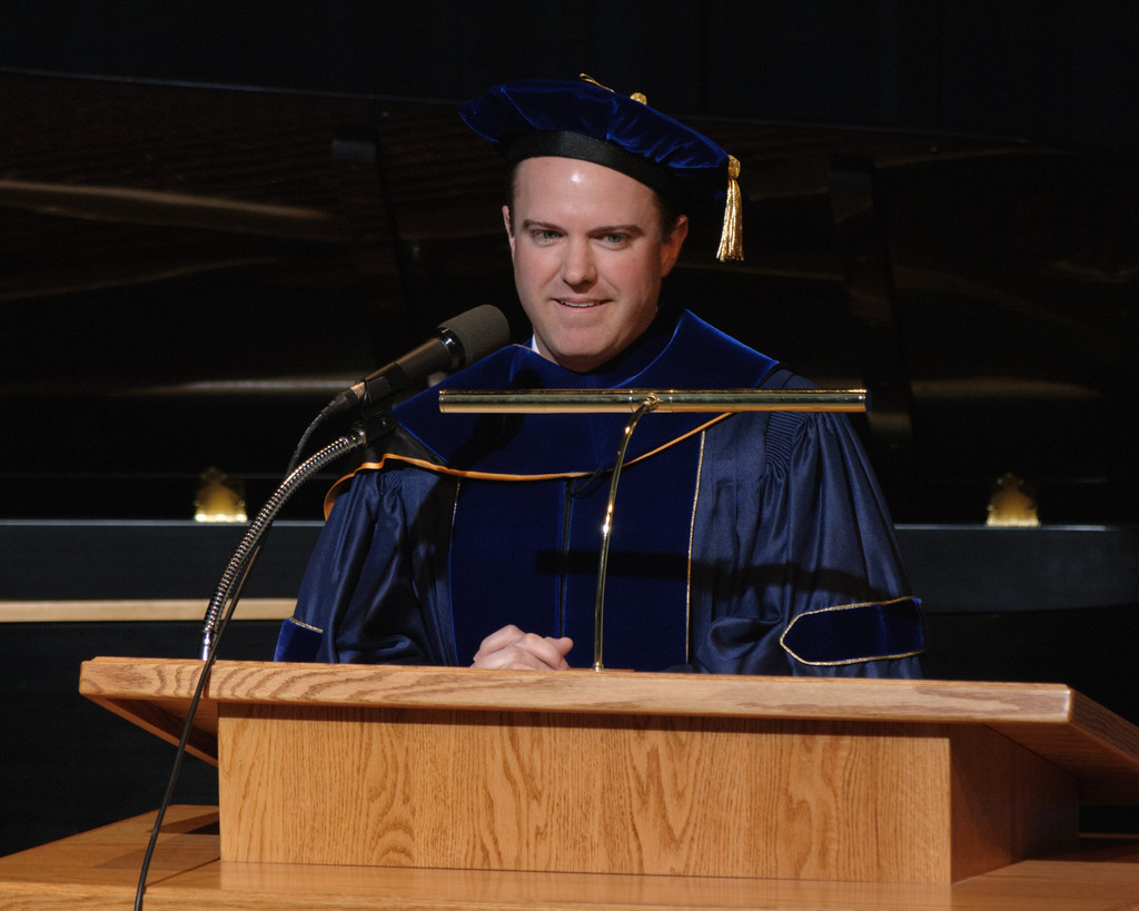 Dr. Joel Hyer speaks during Saturday's commencement ceremony for Chadron State College's master's degree recipients.