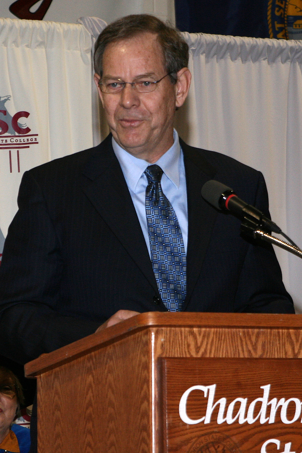 Glenn Novotny makes a point during his address to the graduates of his alma mater Saturday.