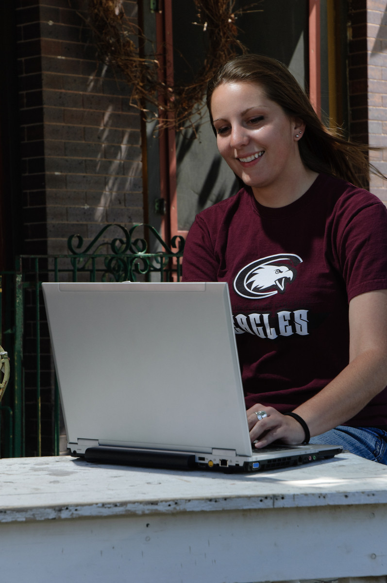 Chadron State College student Kassy Thompson of Crawford participates in an online class while at a coffee shop in downtown Chadron.