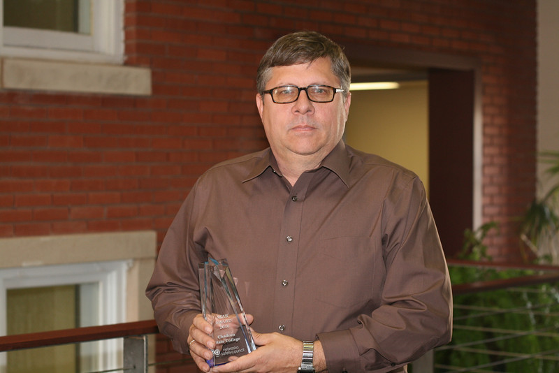 Dale Grant, Chadron State College vice president for administration, displays the Star Award.