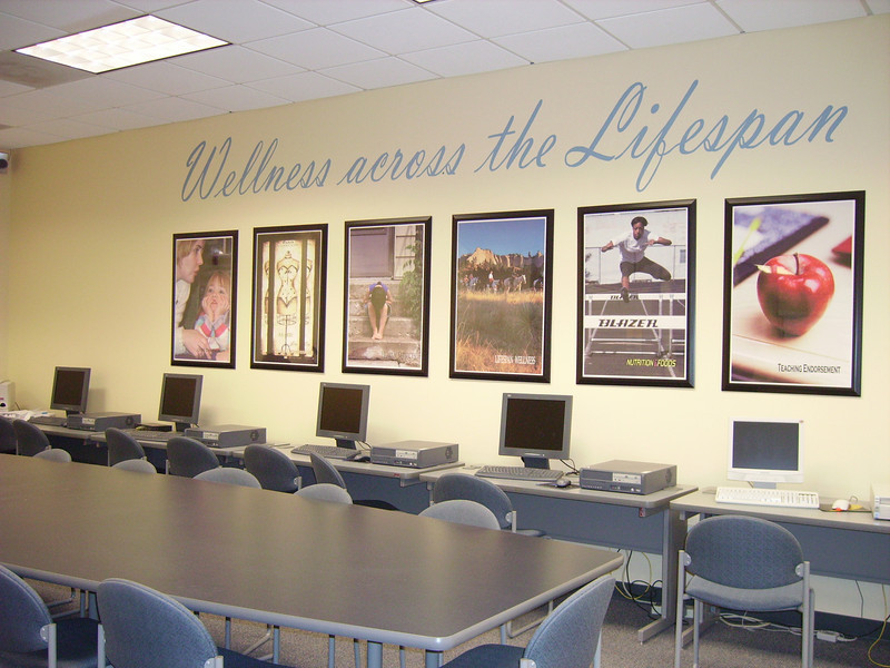 The theme of Chadron State College's family and consumer sciences program is displayed on the wall of one of its classrooms in the Burkhiser Complex.