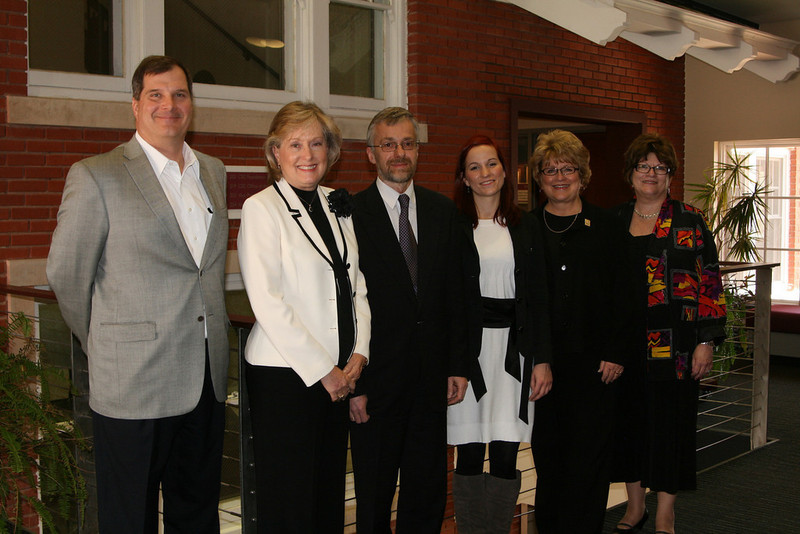 Chadron State College administrators gather for a photo with the two delegates from Poland.