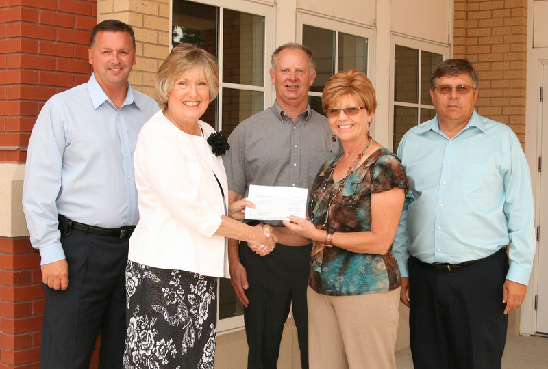 Public Power District presents check to CSC.