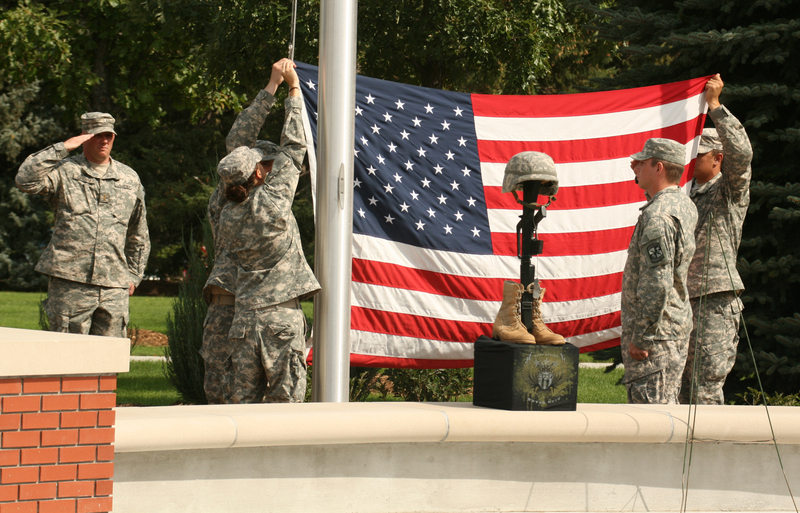 Chadron State College ROTC cadets raise the flag during the 9/11 remembrance ceremony at Chadron State College.