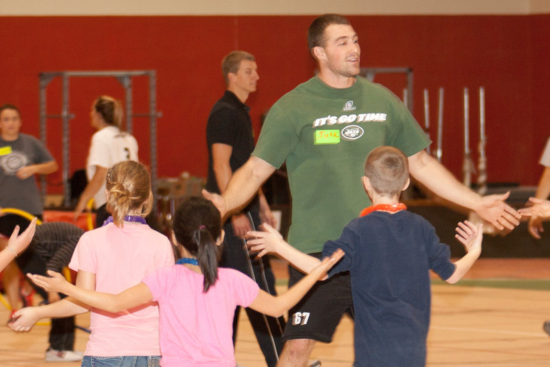 Chadron State College student Jake Rogers of Scottsbluff leads third-graders in a dance during the annual Dance for the Health of It.