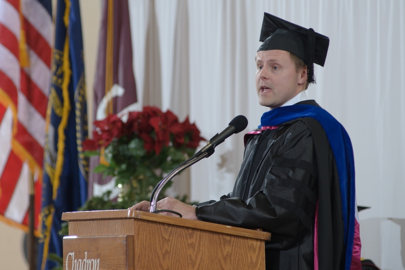 Dr. Jeffrey King makes a point during his commencement address at Chadron State College's ceremony for bachelor's degree recipients.