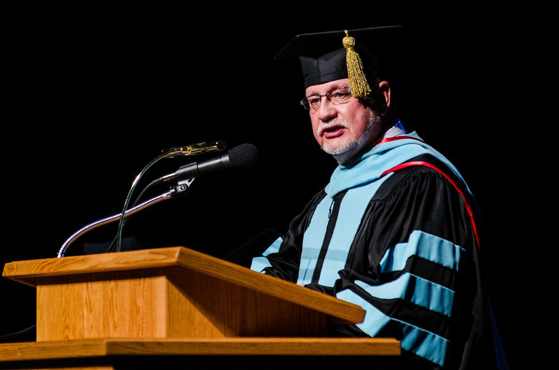 Dr. James Wright delivers the commencement address for Chadron State College's ceremony for master's degree recipients. (Photo by Daniel Binkard)