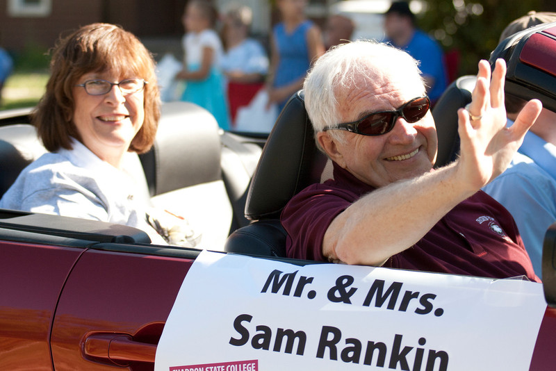 Sam Rankin, retired Chadron State College president, and his wife Sharon ride in the CSC homecoming parade route in 2011. (Photo by Justin Haag)