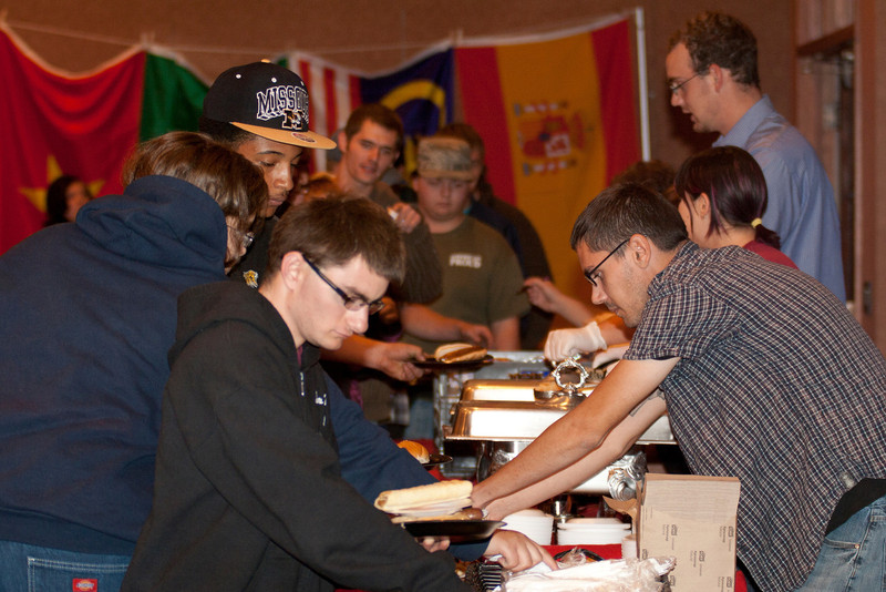 Chadron State College students dish up German cuisine during the 2011 Oktoberfest in the Student Center. The event was sponsored by CSC's Social Science and Public Relations Clubs. (Photo by Justin Haag)