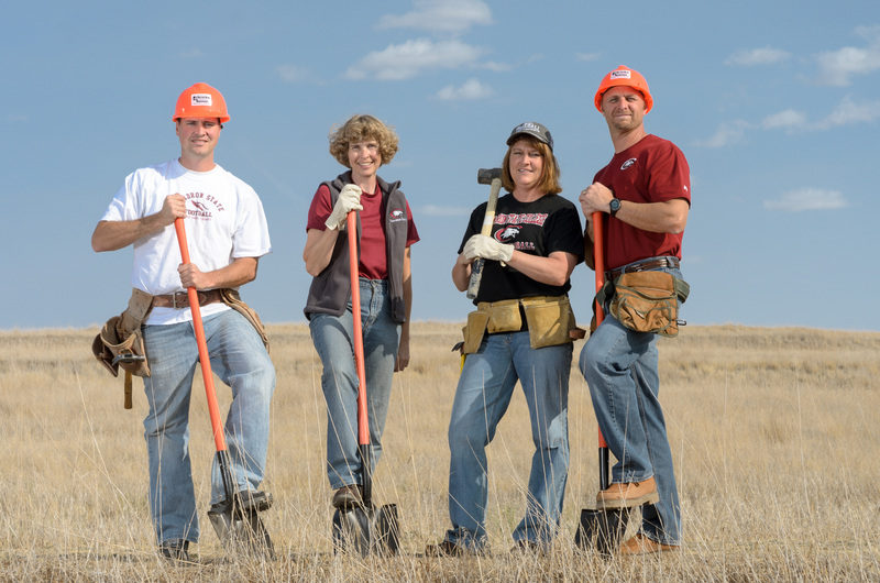 There's a lot of building getting under way at Chadron State College this fall, including the Chadron State Foundation's annual fall campaign. The campaign volunteer leaders, Jason Carnahan, Tina McLain, Donna Ritzen and Brent Bargen, are dressed for the occasion. (Photo by Daniel Binkard)