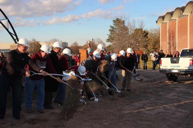 Speakers of the ceremony and others involved with the project perform the ceremonial groundbreaking at the conclusion of the event. (Photo by Shaun Wicen)