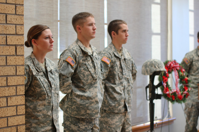 Chadron State College ROTC cadets stand near the battlefield cross. (Photo by Justin Haag)