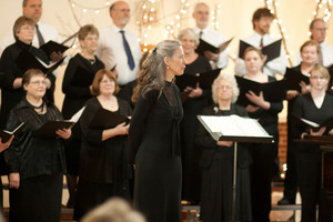 Dr. Una Taylor leading a vocal concert