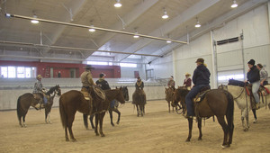 Students riding horses