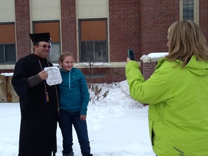 Scott Stephenson poses with his wife after graduation