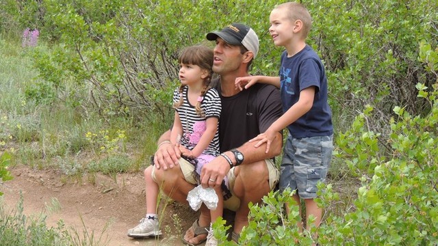 Jake Holscher, center, with his children Reka, left, and Rade, right. The CSC graduate plans to ride across the country in June.